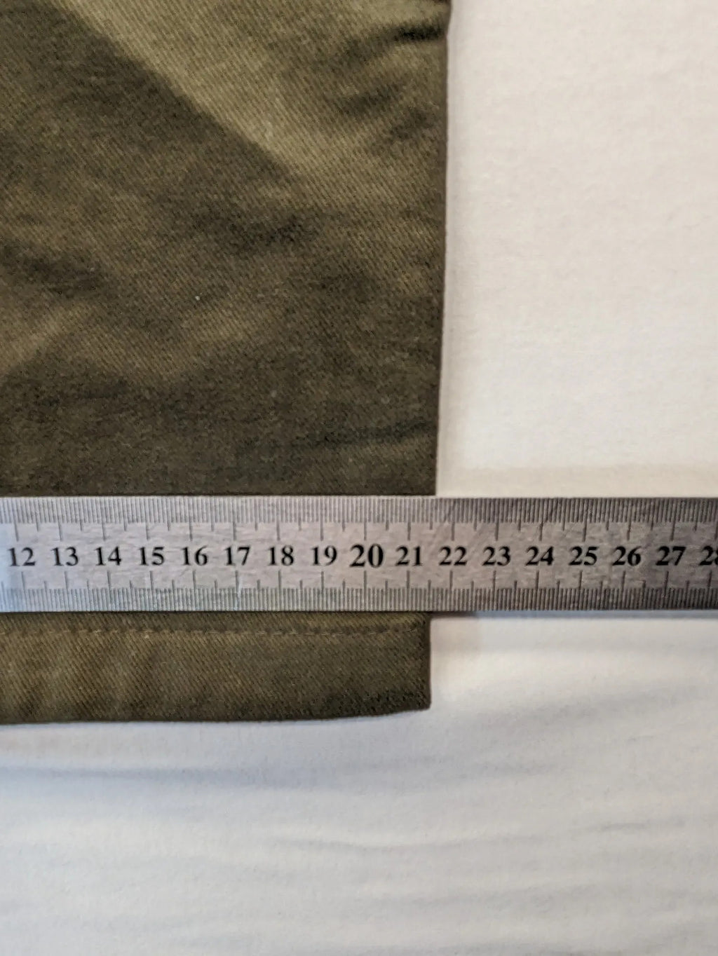 Lands' End green cargo pants with plaid flannel lining and traditional fit design.