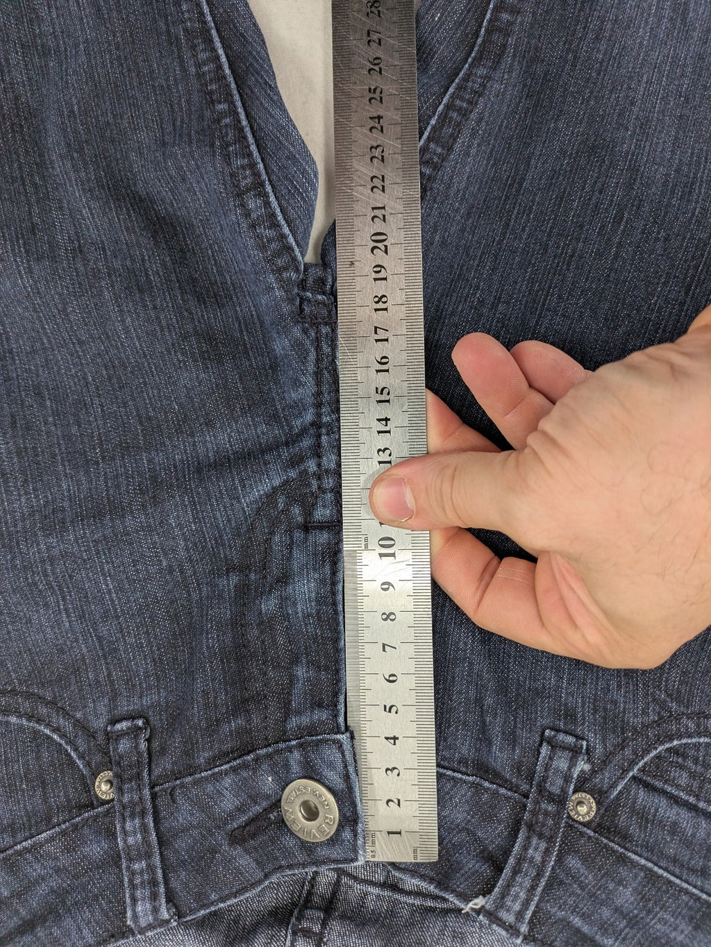 Review straight leg jeans dark blue low rise stretch denim with classic design.