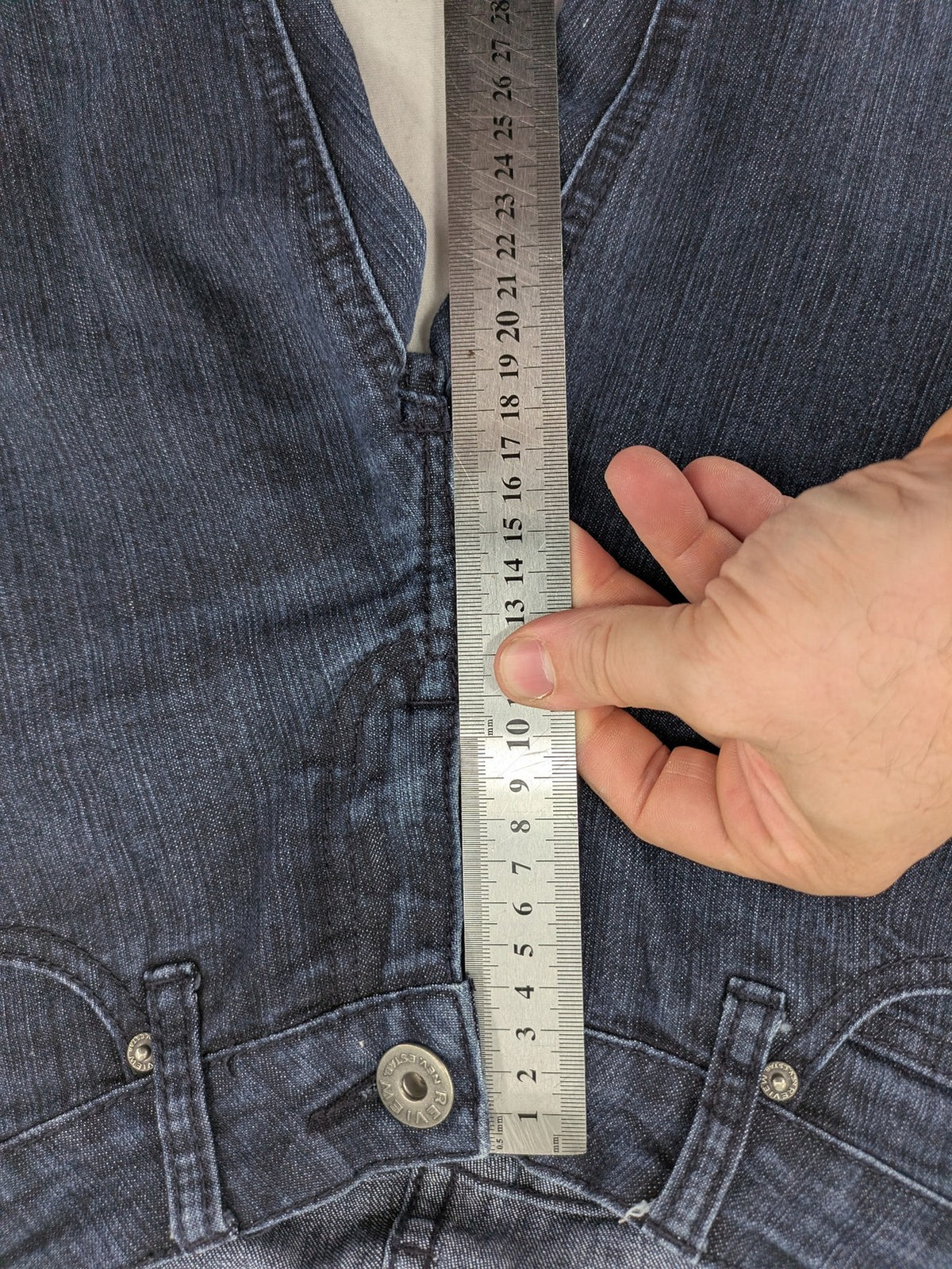 Review straight leg jeans dark blue low rise stretch denim with classic design.