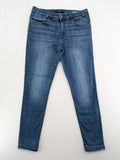 Mavi blue high rise super skinny jeans with medium wash and stretch denim material.