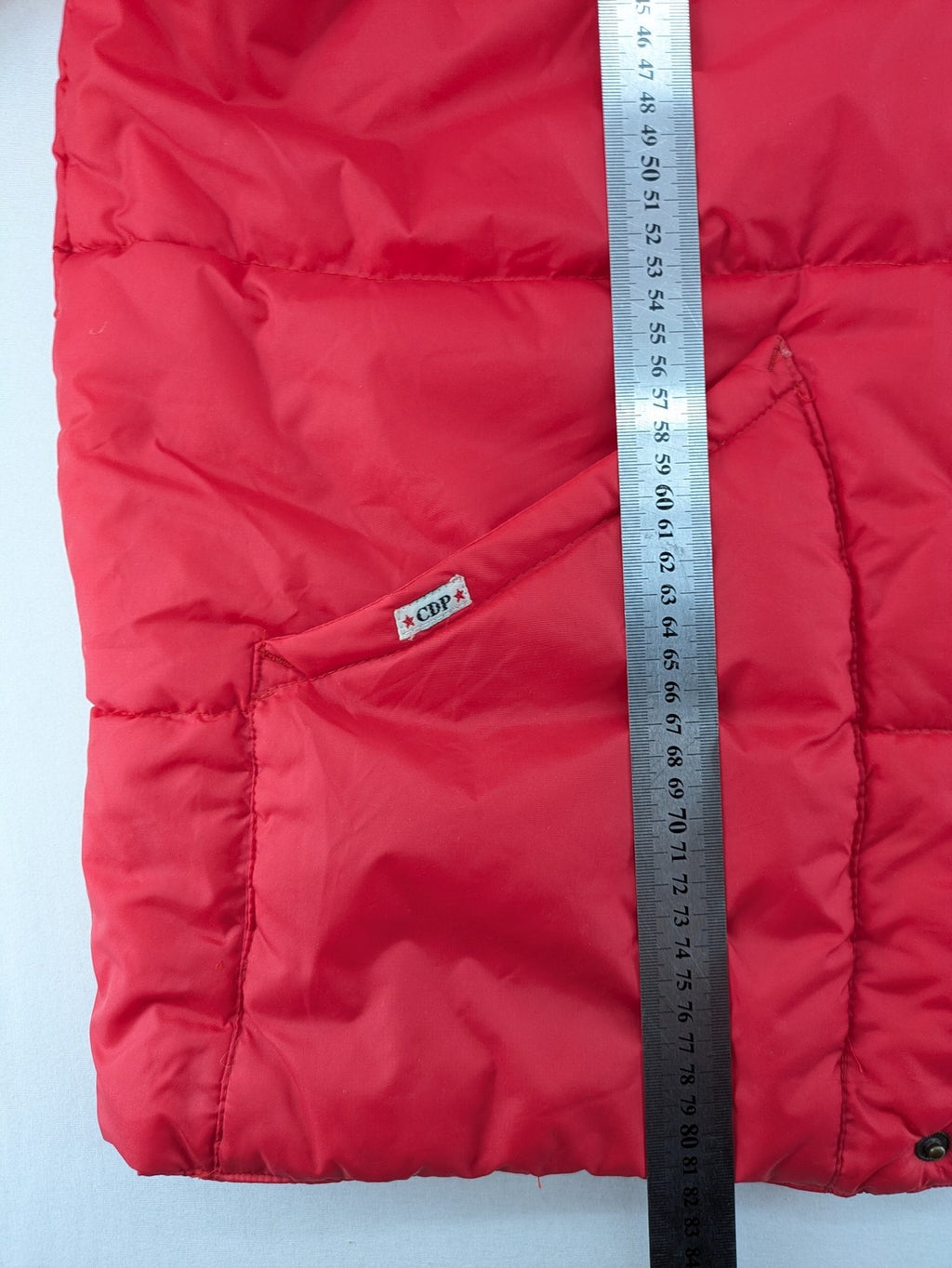 Rox red puffer vest with detachable sleeves and hood, vintage style.