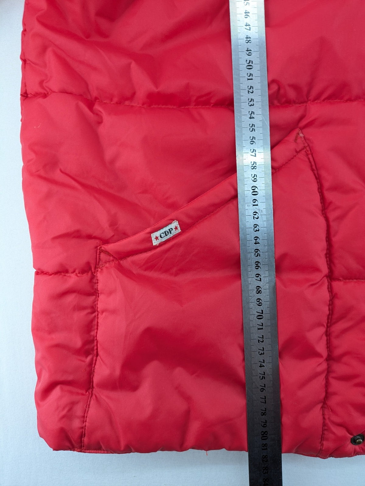 Rox red puffer vest with detachable sleeves and hood, vintage style.