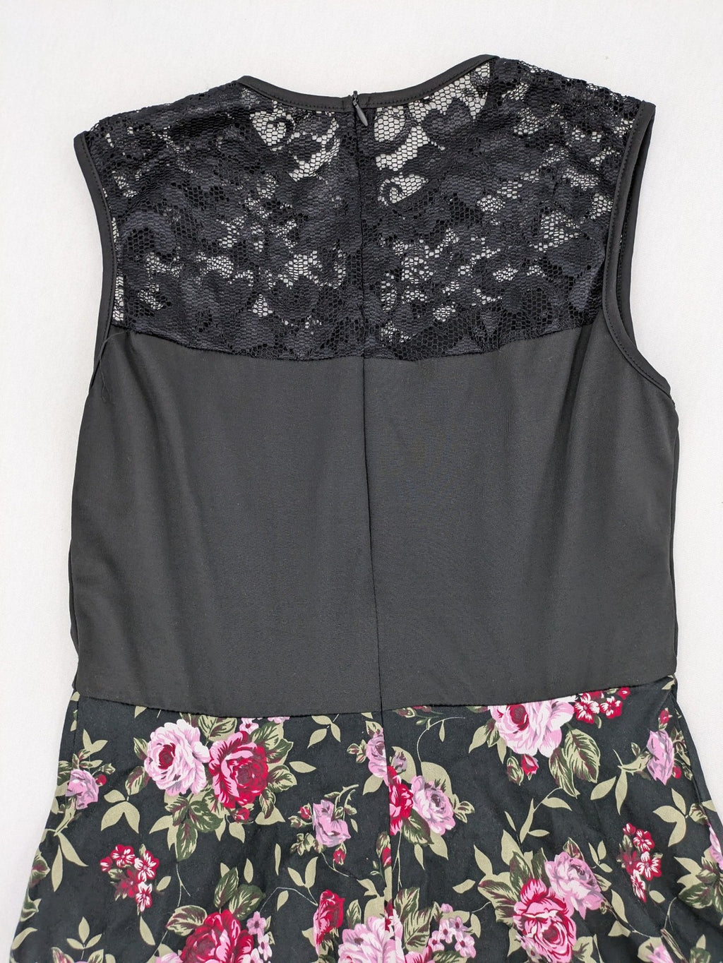M/L black A-line dress with floral skirt and lace trim details.