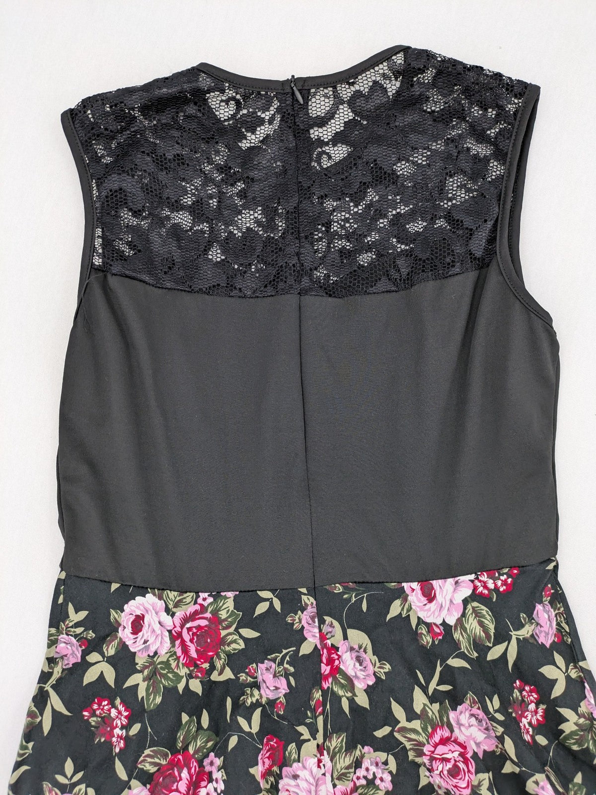 M/L black A-line dress with floral skirt and lace trim details.