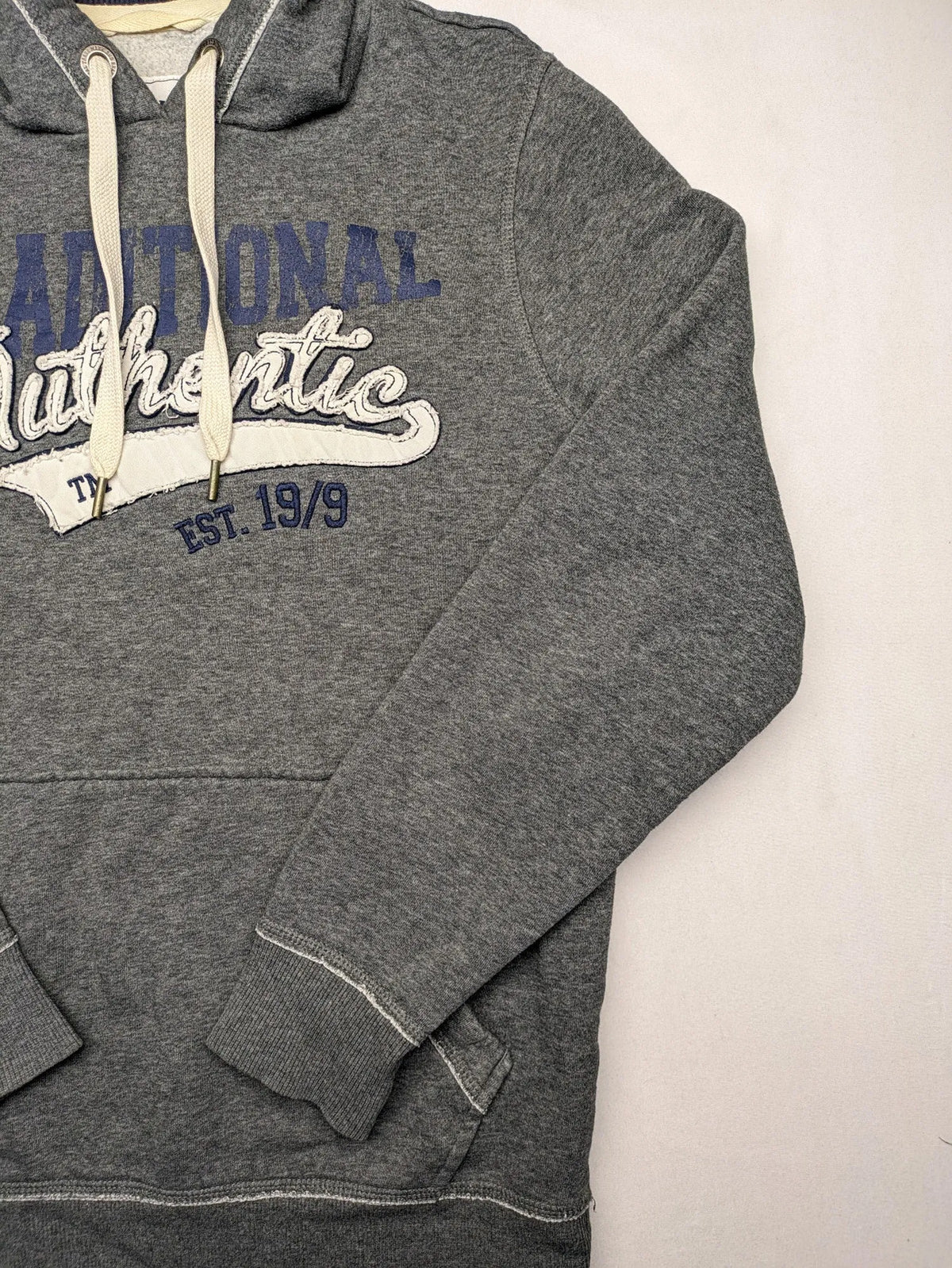 Livergy grey zip-through hoodie with "Traditional Authentic" graphic, kangaroo pocket, soft material.