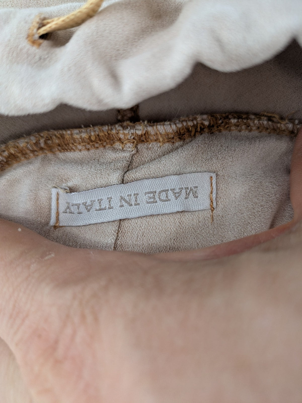 Made In Italy beige pants with crinkle texture and rock-style patches, drawstring waist.