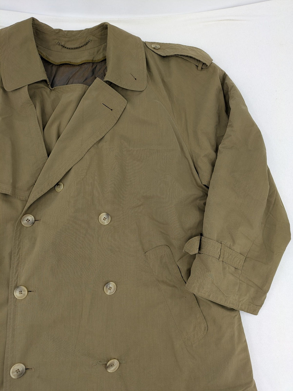 Studio Novum khaki trench coat double-breasted design with belt and wool lining.