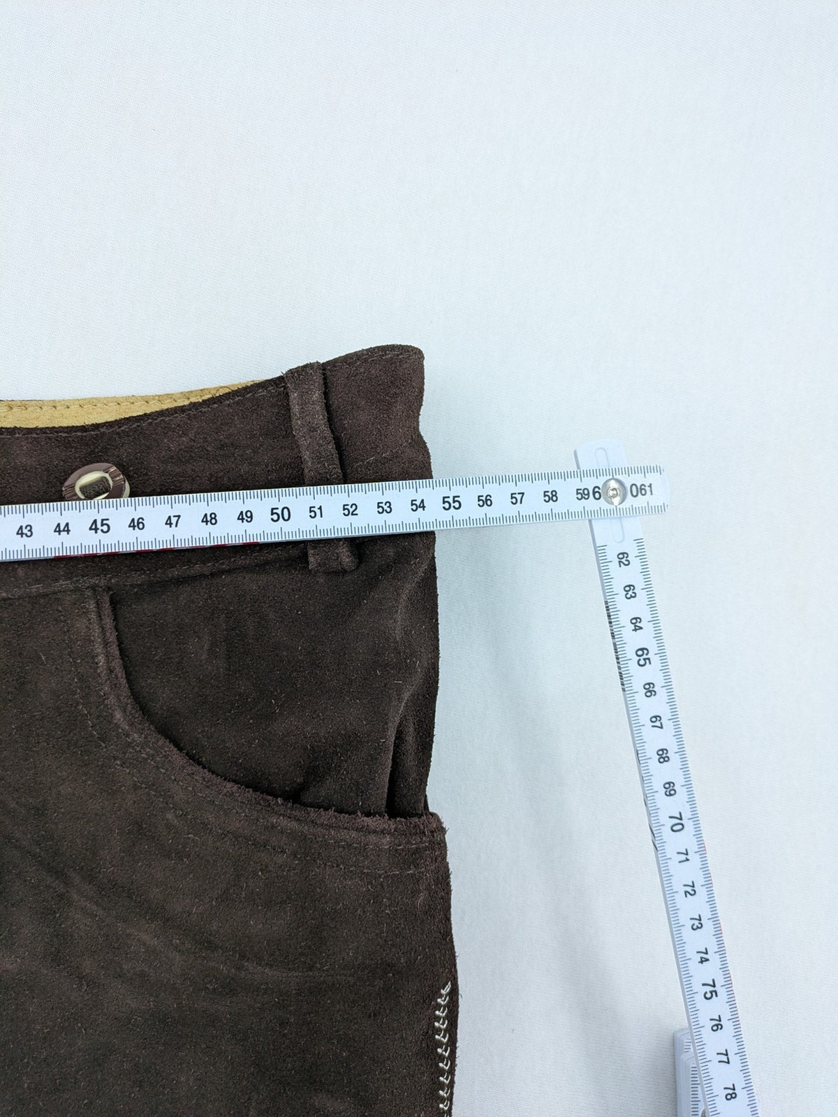 Braun traditional leather pants brown suede with intricate embroidery on bib and legs.