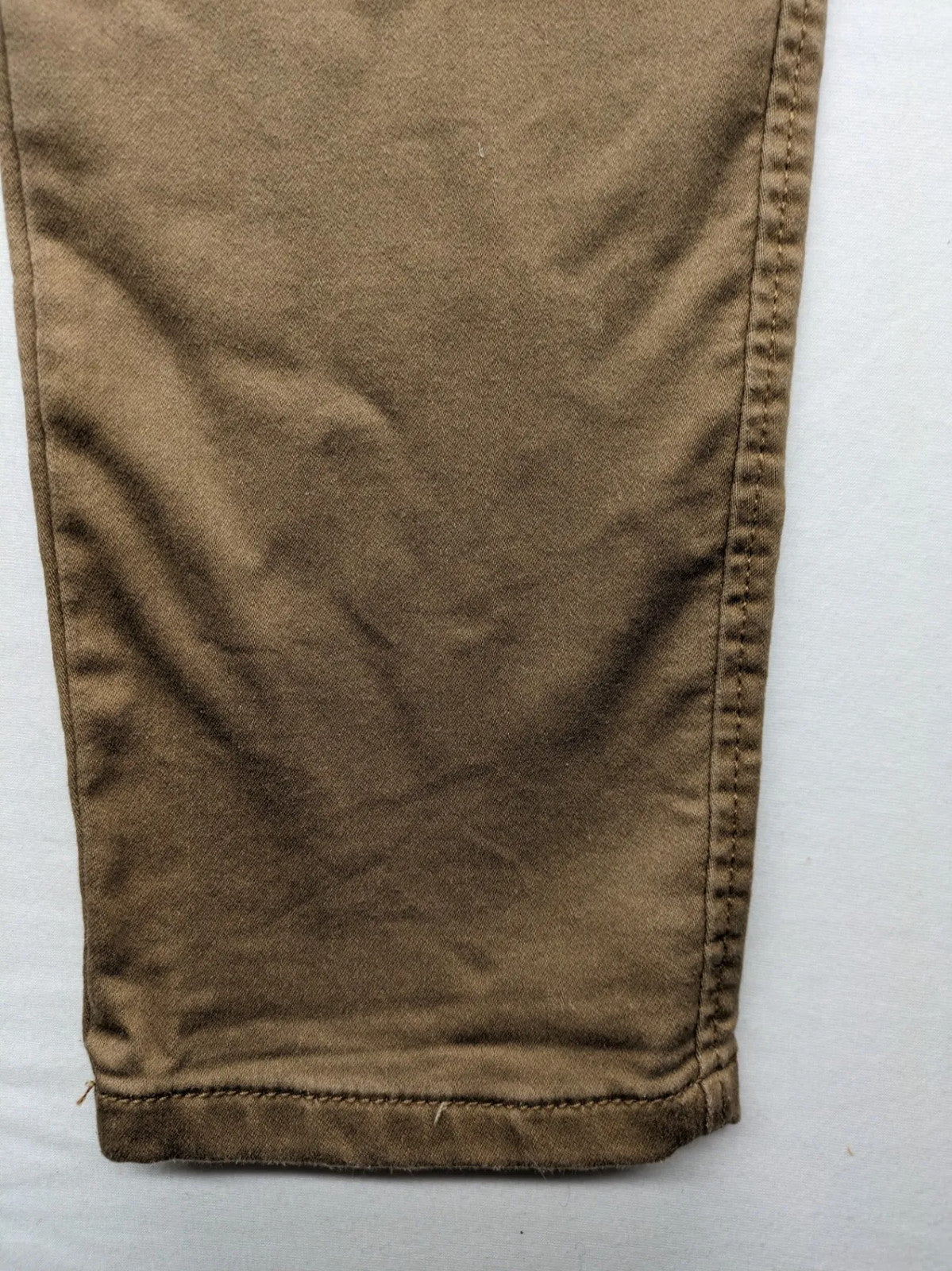 Laura Torelli khaki jeggings slim fit with elastic waistband and functional back pockets.