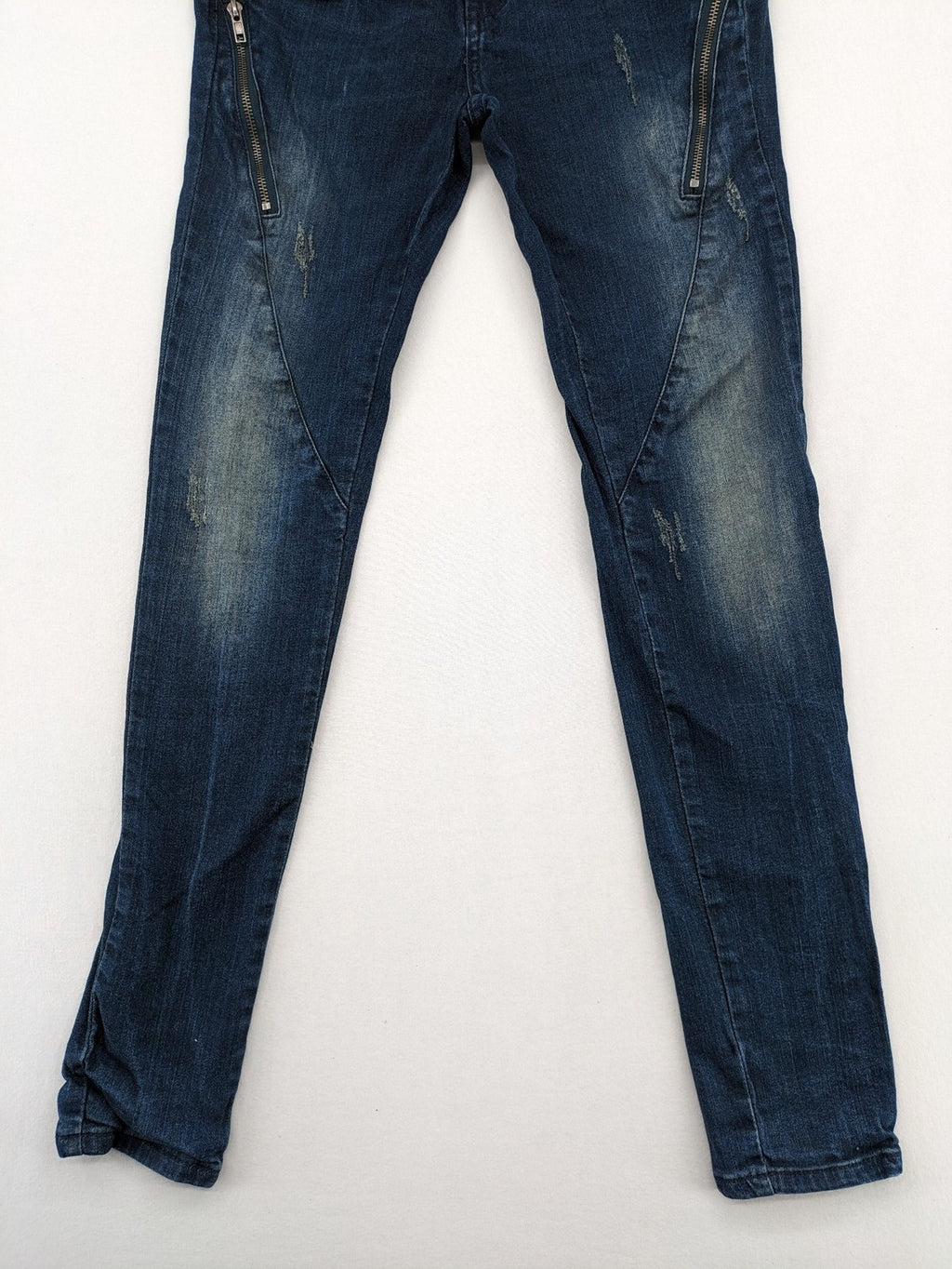 Place du Jour blue biker jeans with zippers, used-look wash, and star rivet detail.