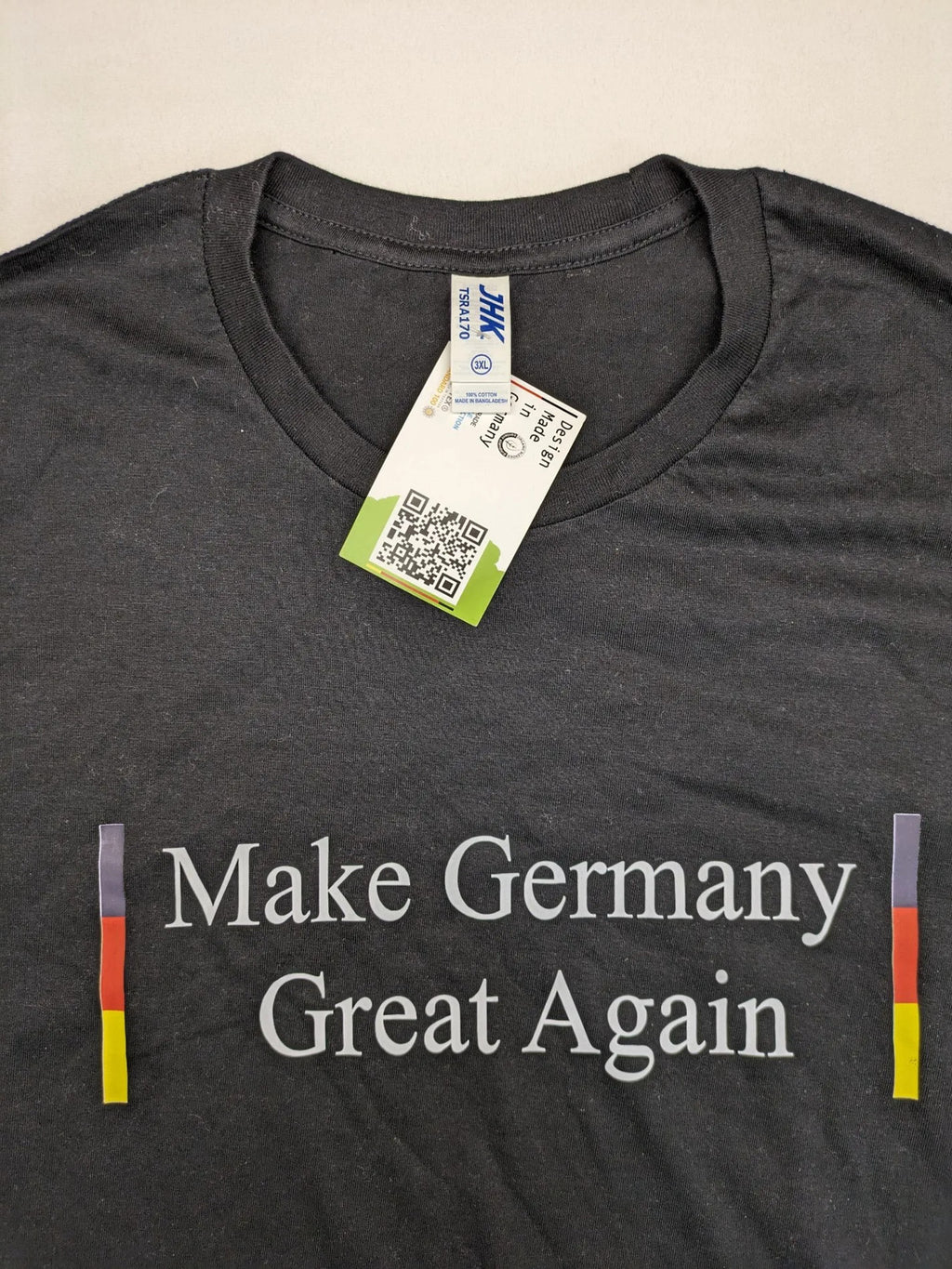 AFD turtle neck jumper multi "Make Germany Great Again" print with German flag colors.