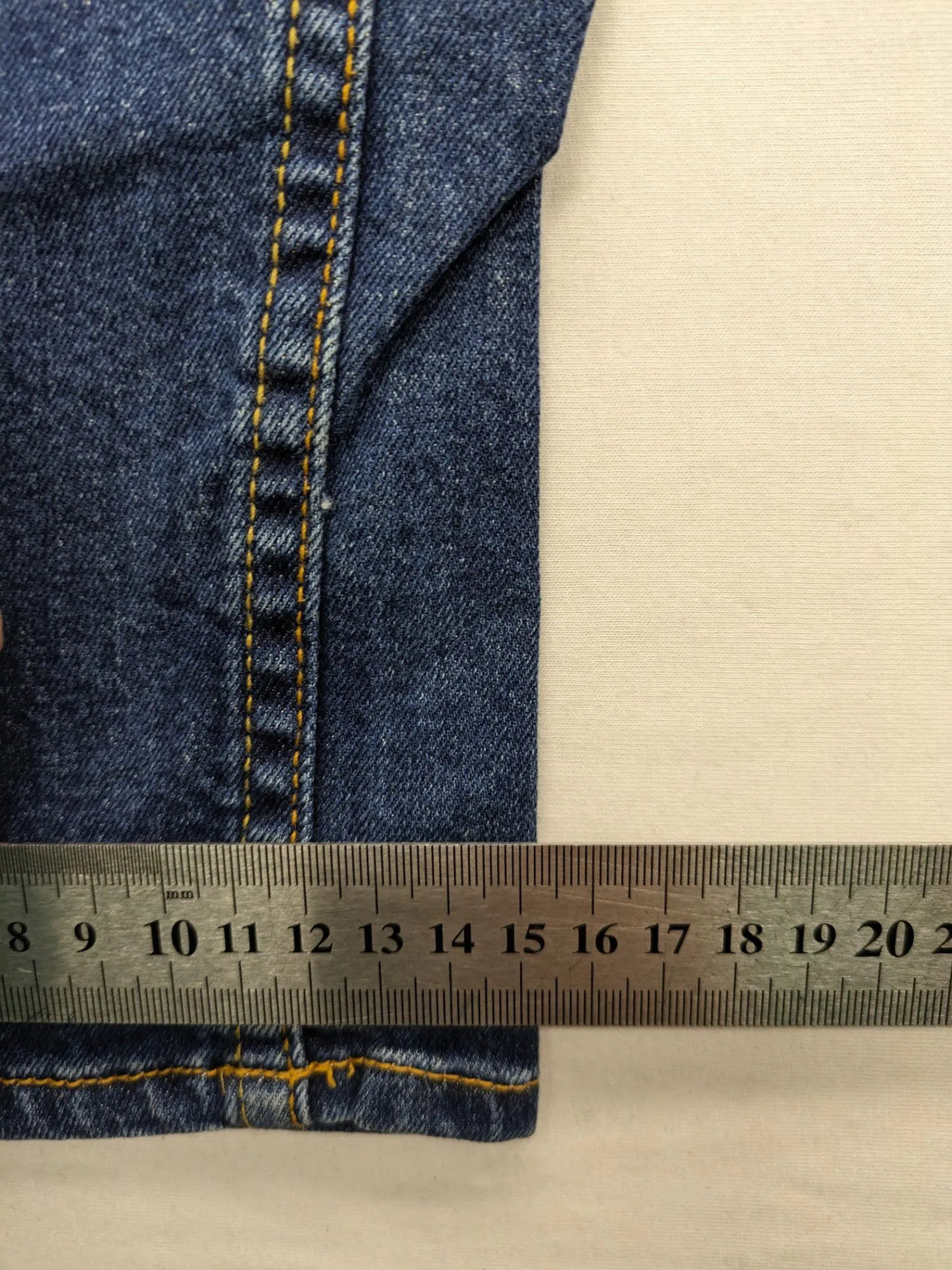 Vingino blue straight jeans medium wash 5-pocket design with zipper fly and stretch denim.