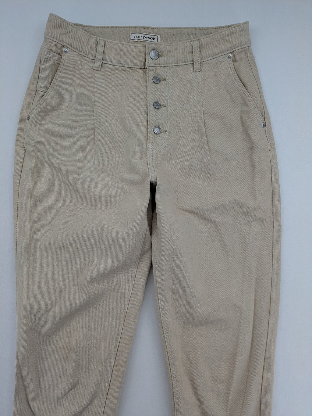 Pimkie beige mom jeans high waist tapered fit with front button placket and cotton material.
