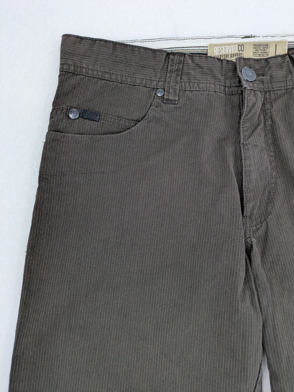 Reserved Co brown straight jeans with fine cord texture and classic 5-pocket design.