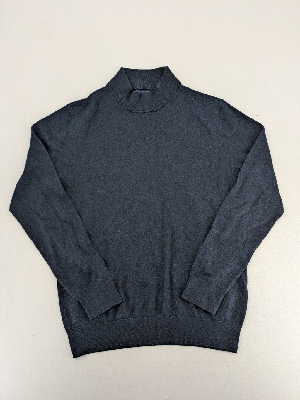 Christian Berg navy turtle neck jumper with ribbed cuffs and high wool blend.