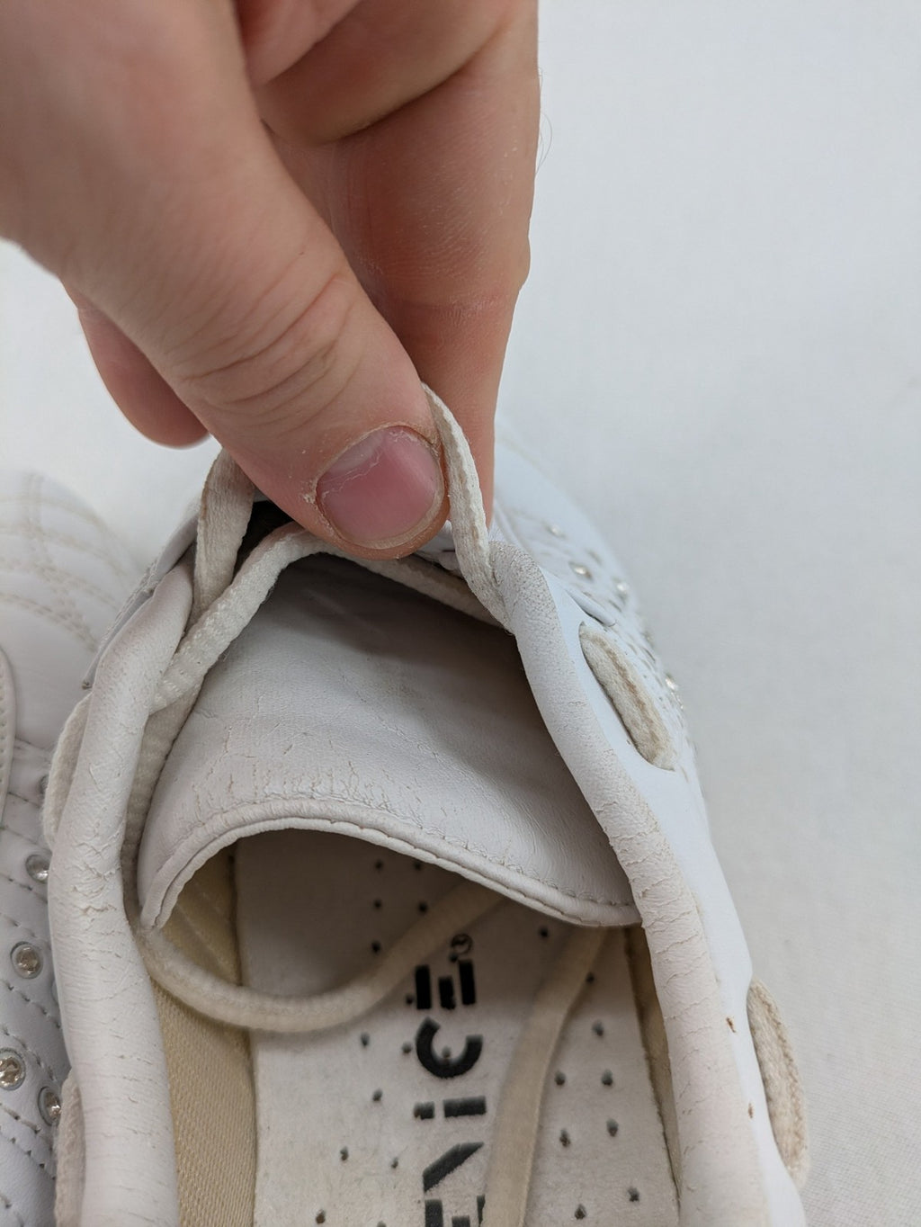 Venice low-top sneakers beige and white with rhinestone embellishments and unique sole pattern.