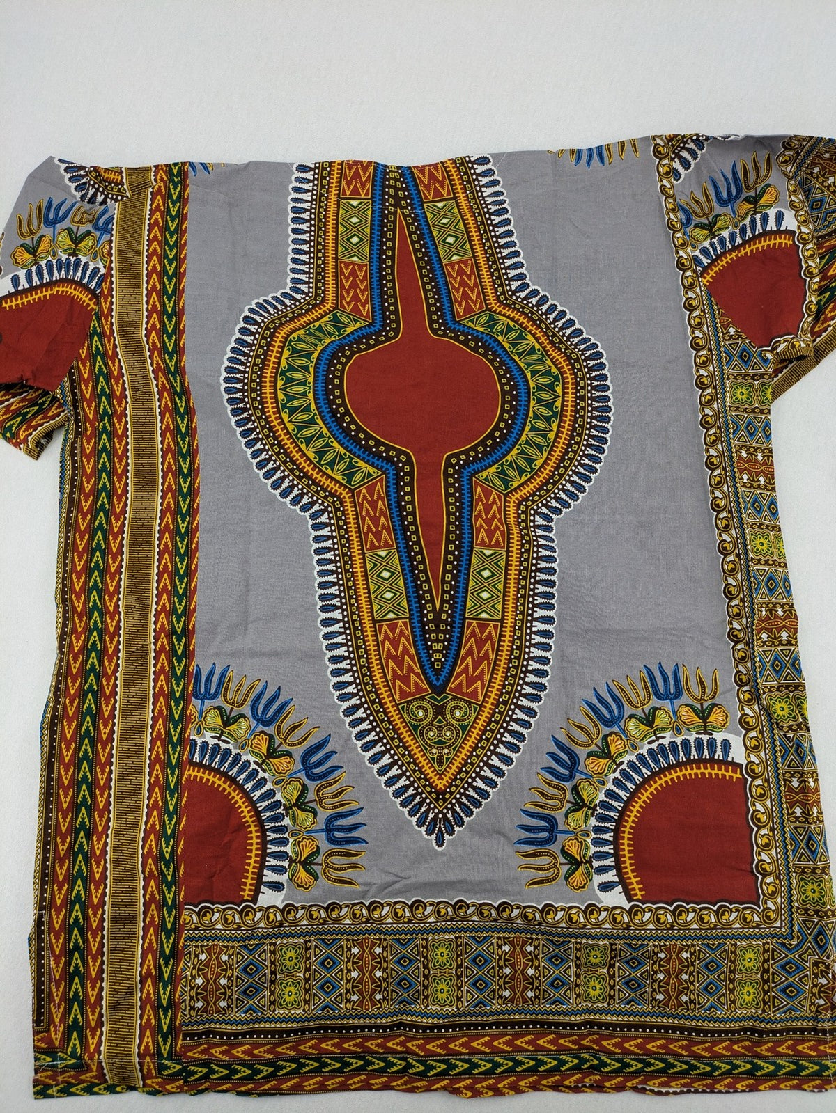 Kaftan multi Dashiki top grey with tribal patterns and front pockets, V-neck design.