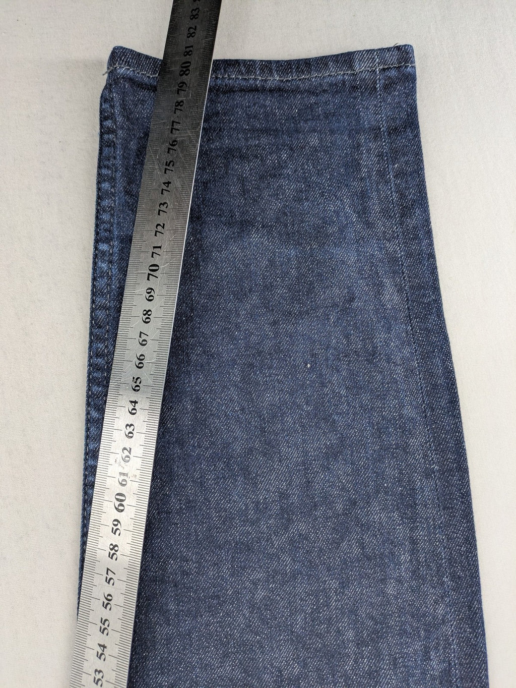 DISTRIKT NØRREBRO blue slim fit jeans with classic rinse wash and stretch denim material.