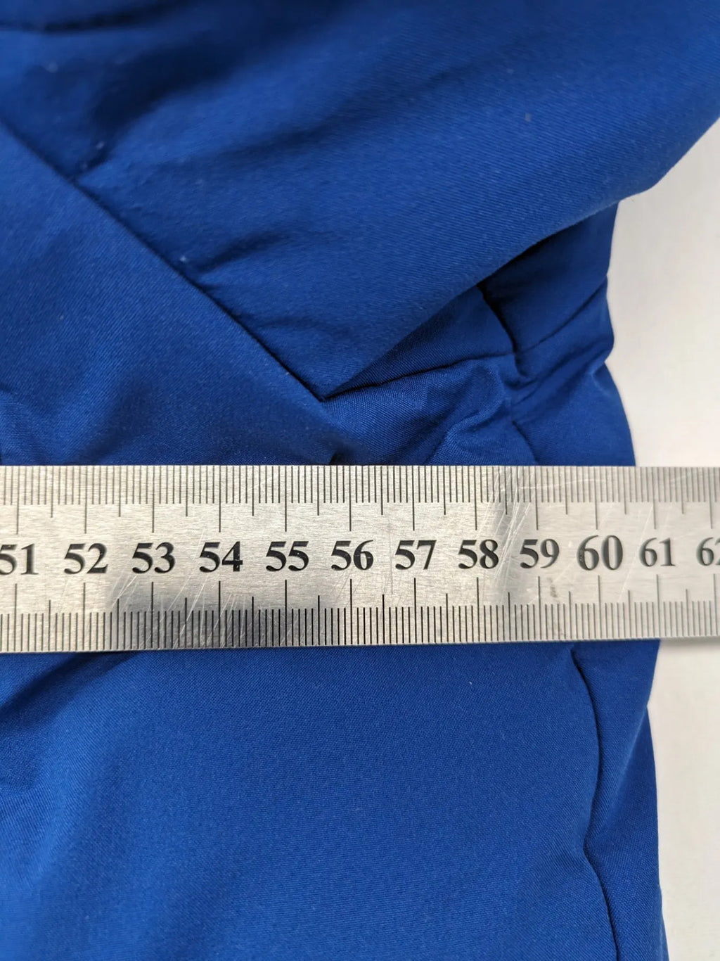 C&A blue winter jacket with hood, zip closure, and multiple pockets, used condition.