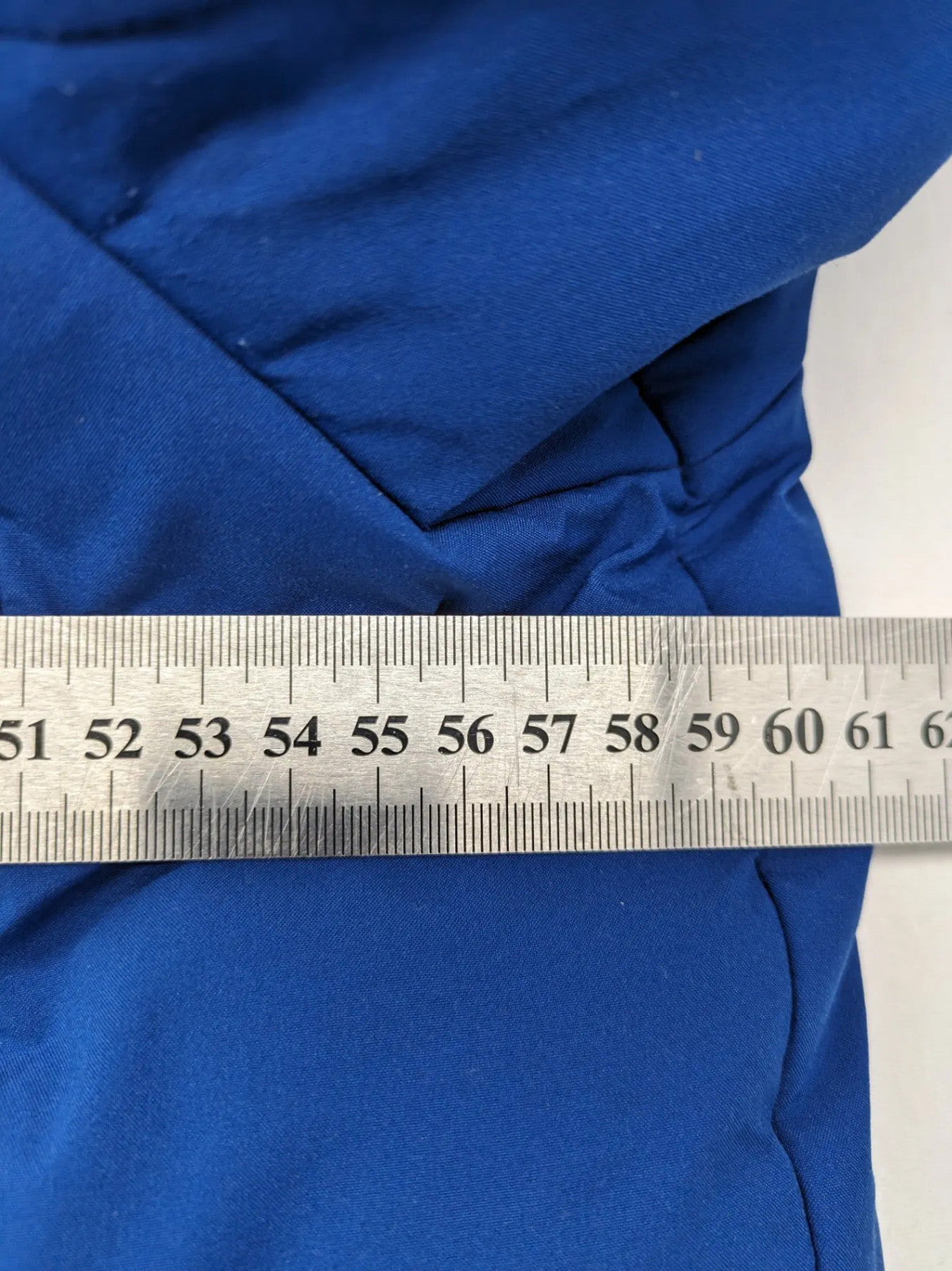 C&A blue winter jacket with hood, zip closure, and multiple pockets, used condition.