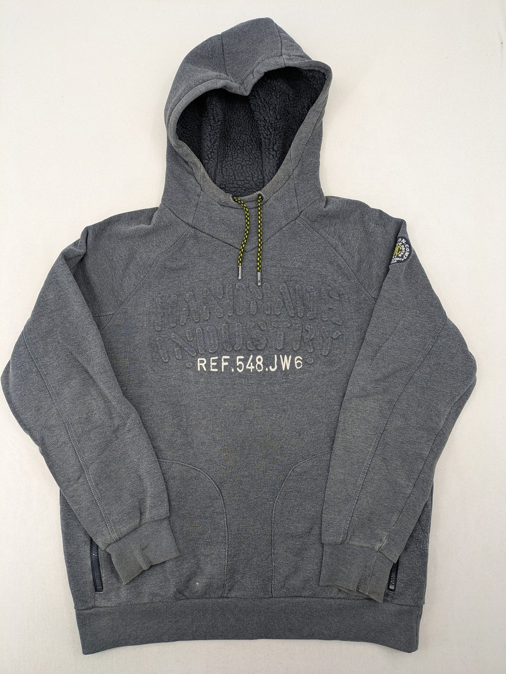 C&A grey hoodie with embossed chest logo, teddy-lined hood, and side zip pockets.