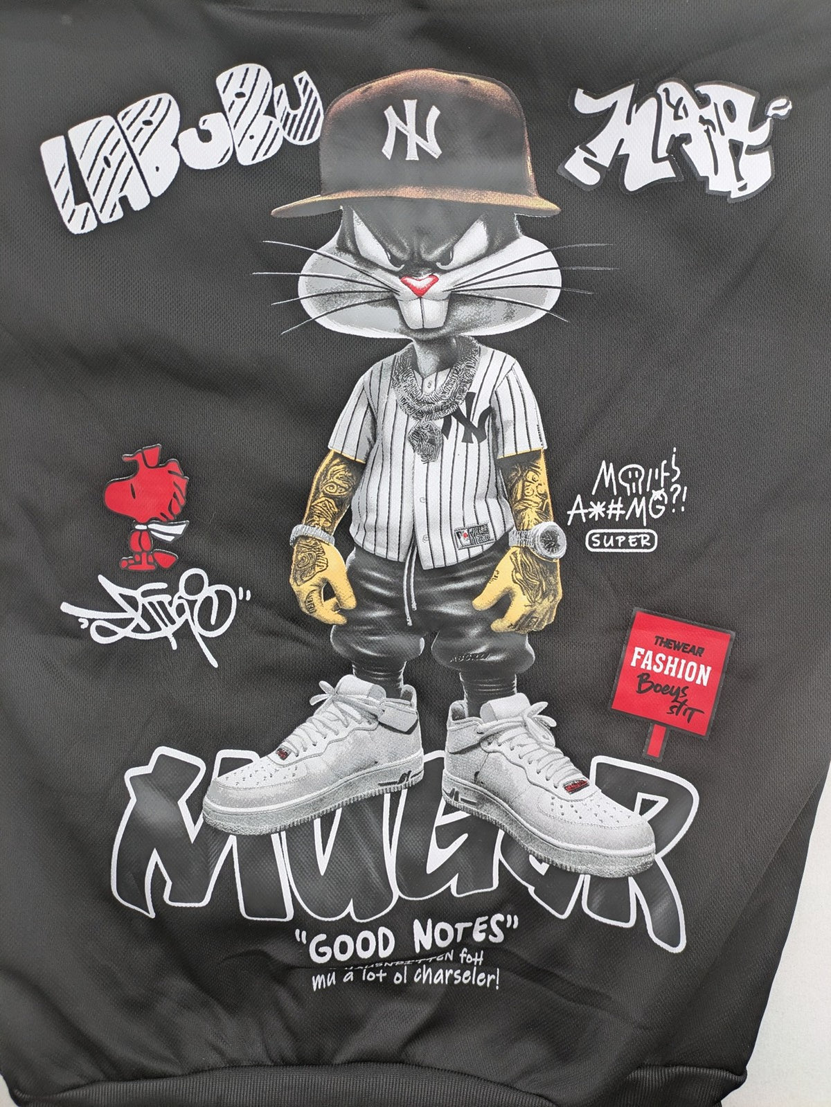 Kuima multi graphic hoodie black featuring large Bugs Bunny print and kangaroo pocket.