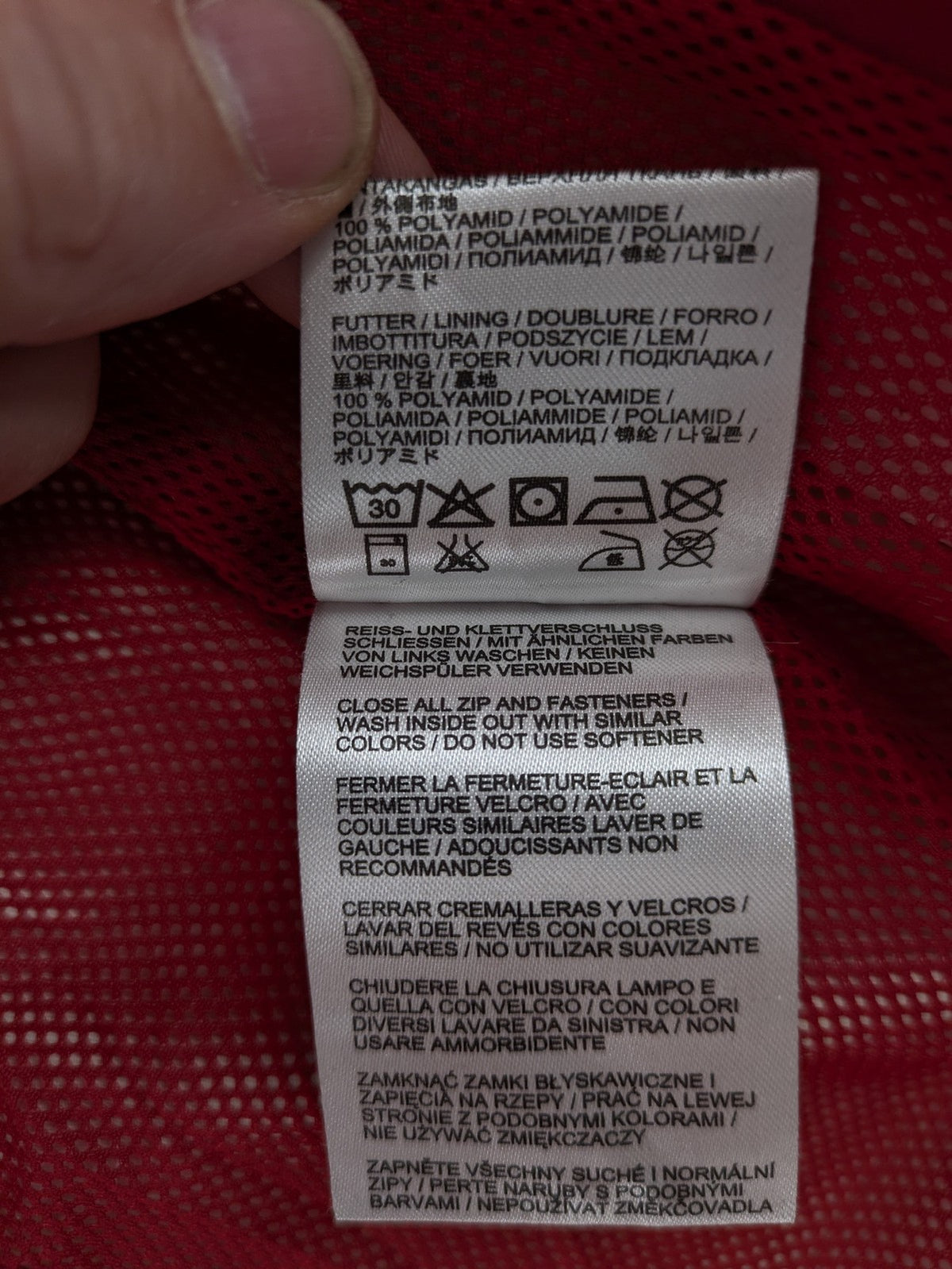 Jack Wolfskin red outdoor jacket with adjustable hood and Texapore waterproof technology