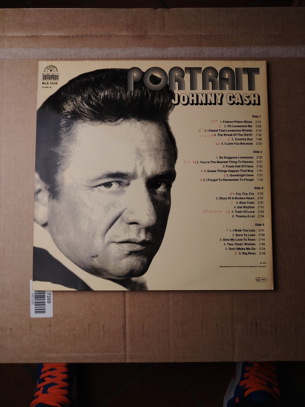 Johnny Cash blue vinyl record signed 12" LP with iconic music history.