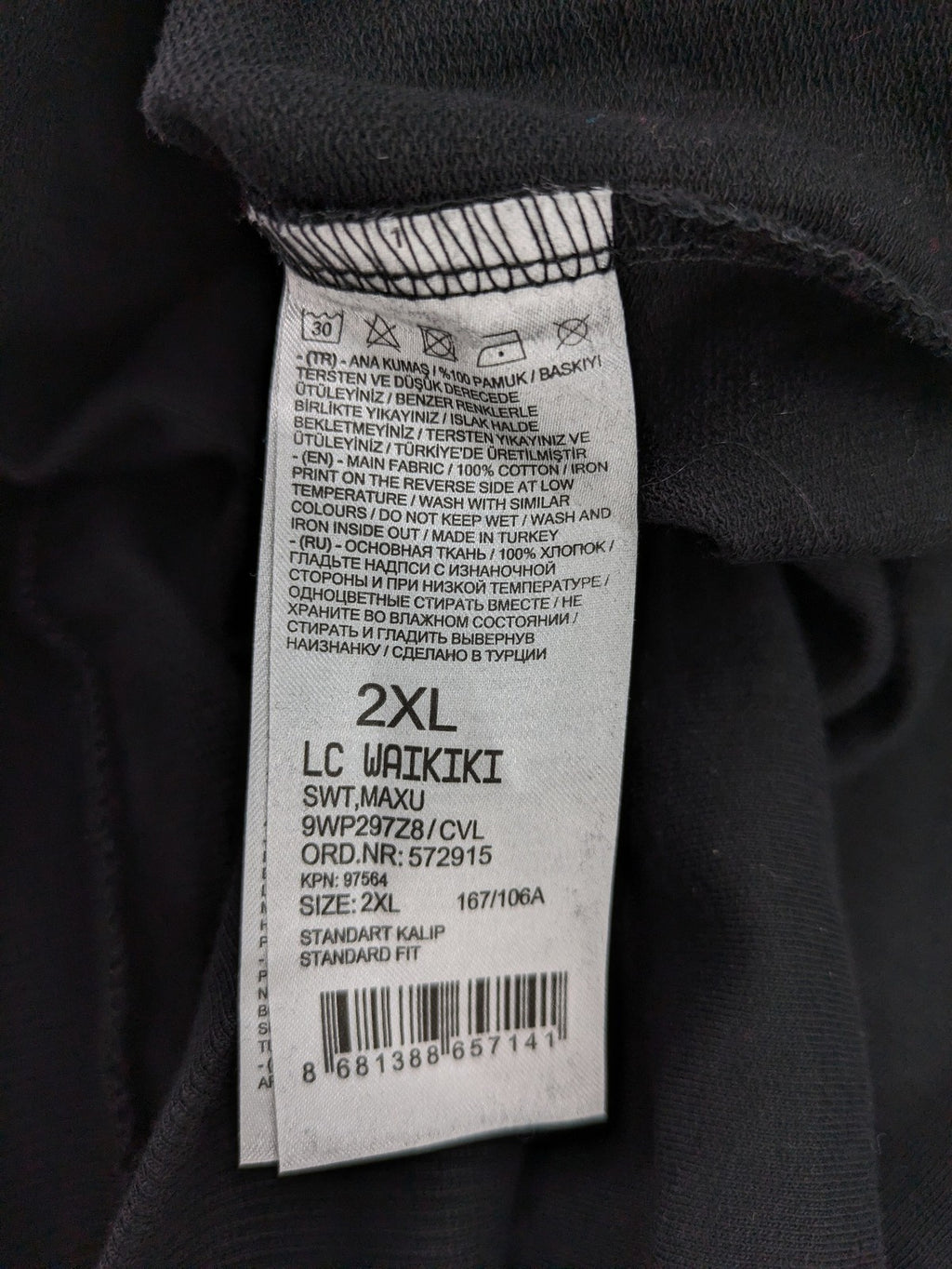 LC Waikiki black turtle neck jumper featuring Atatürk graphic print and signature.