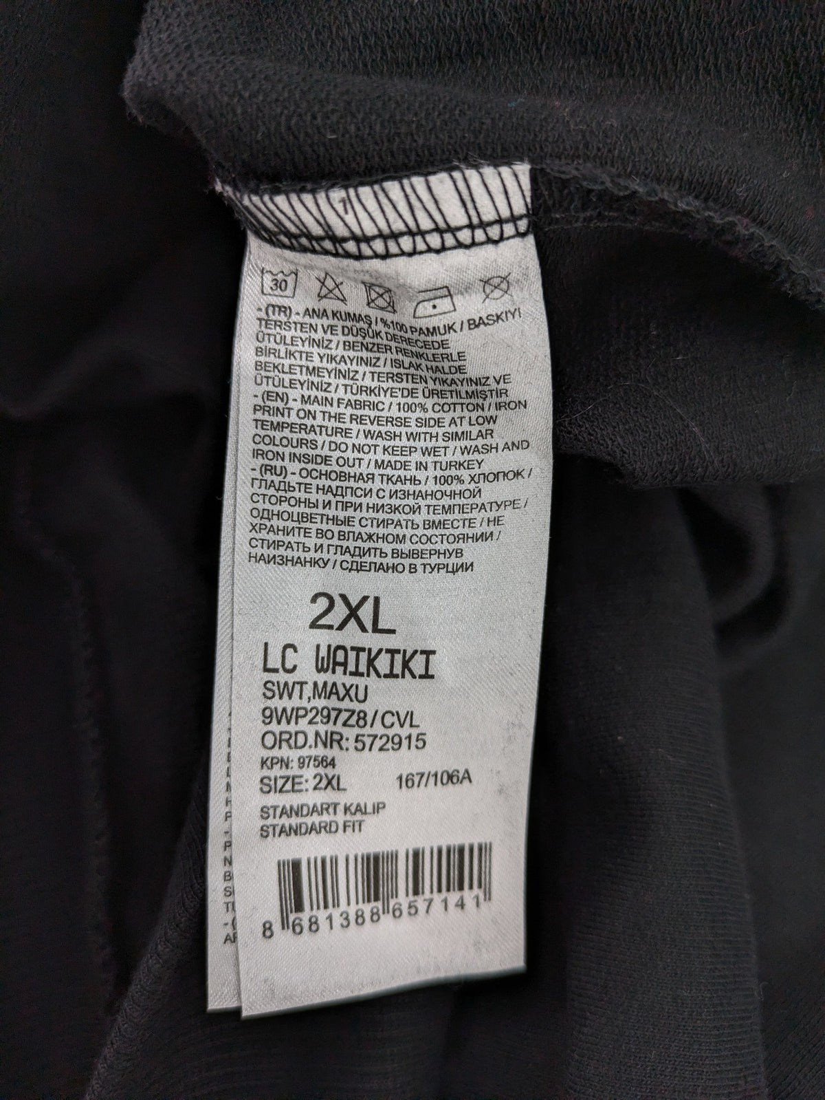 LC Waikiki black turtle neck jumper featuring Atatürk graphic print and signature.