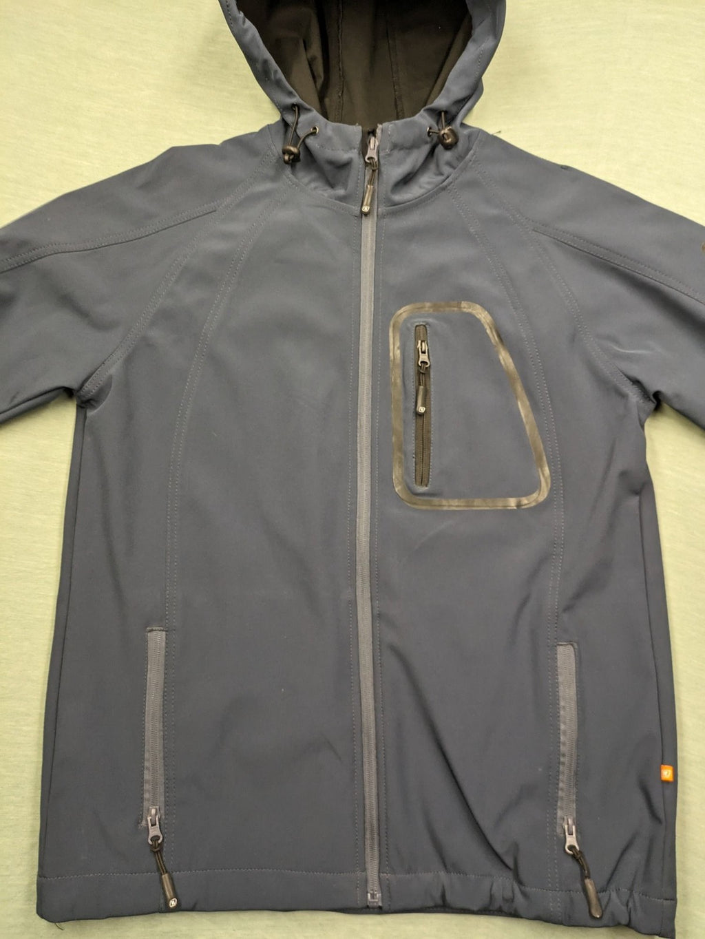Life Line grey softshell jacket with adjustable hood and durable wind-resistant material.