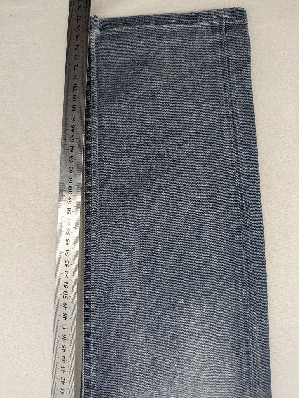 G-Star Raw grey denim straight jeans with classic button fly and subtle branding details.
