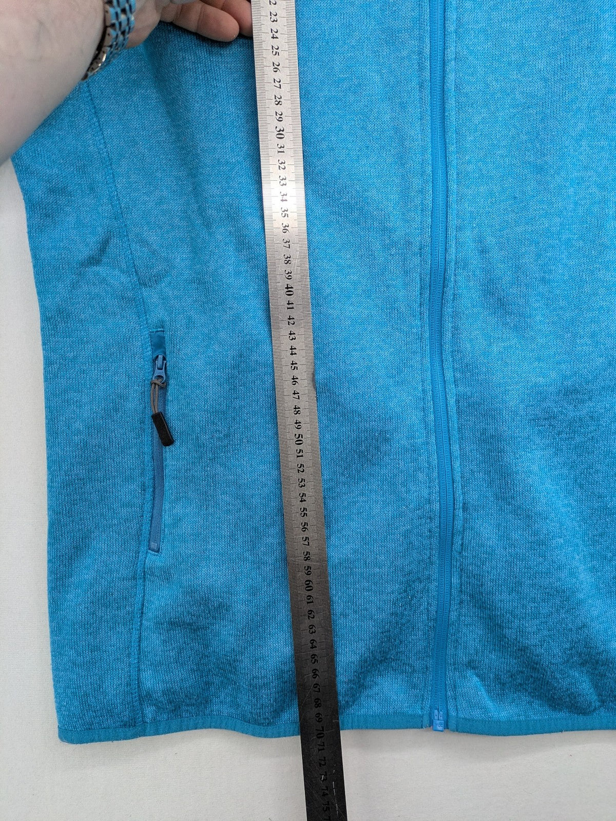 Stooker blue and turquoise fleece jacket with full zip and stand-up collar.