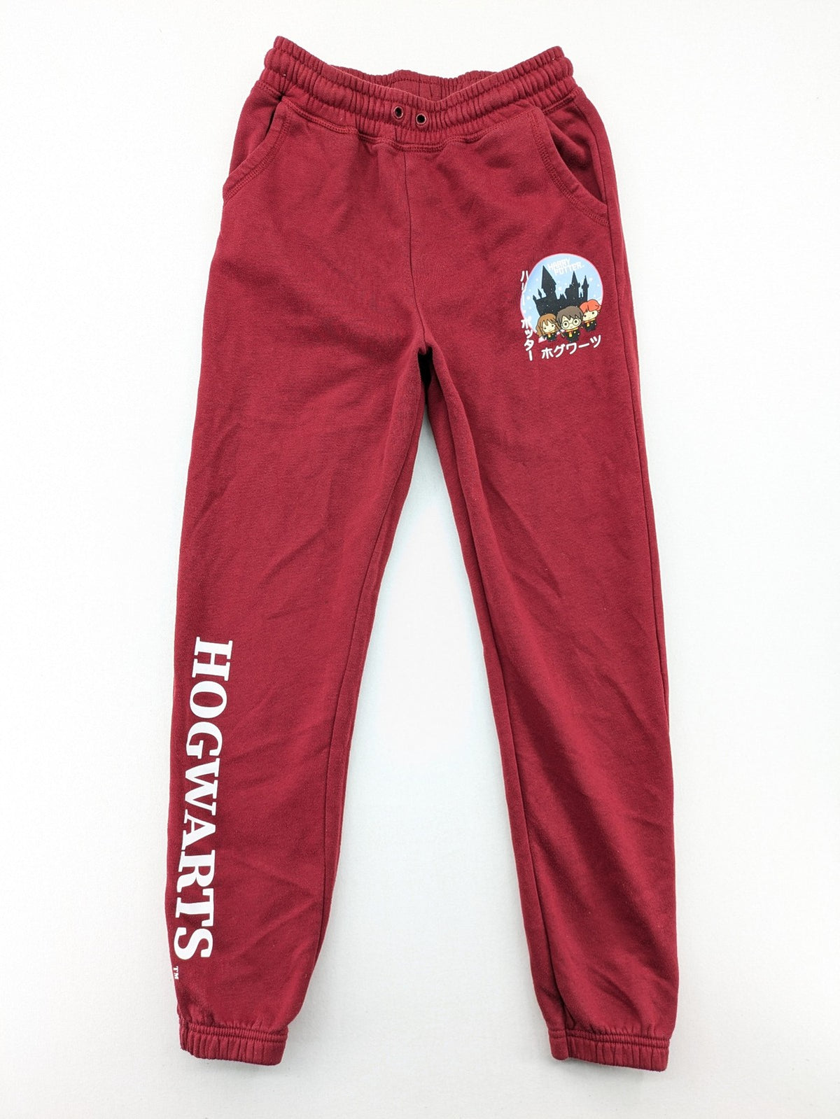 Harry Potter burgundy sweatpants featuring "HOGWARTS" print and Chibi graphic of Harry, Ron, Hermione.
