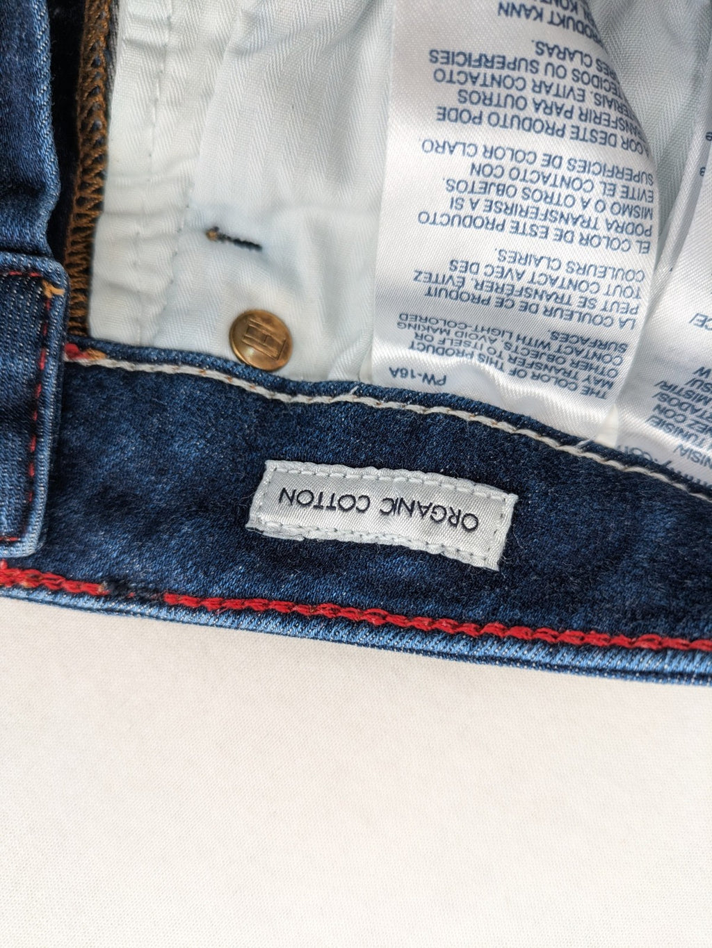 Tommy Hilfiger blue skinny jeans, five-pocket design, made from organic cotton blend.