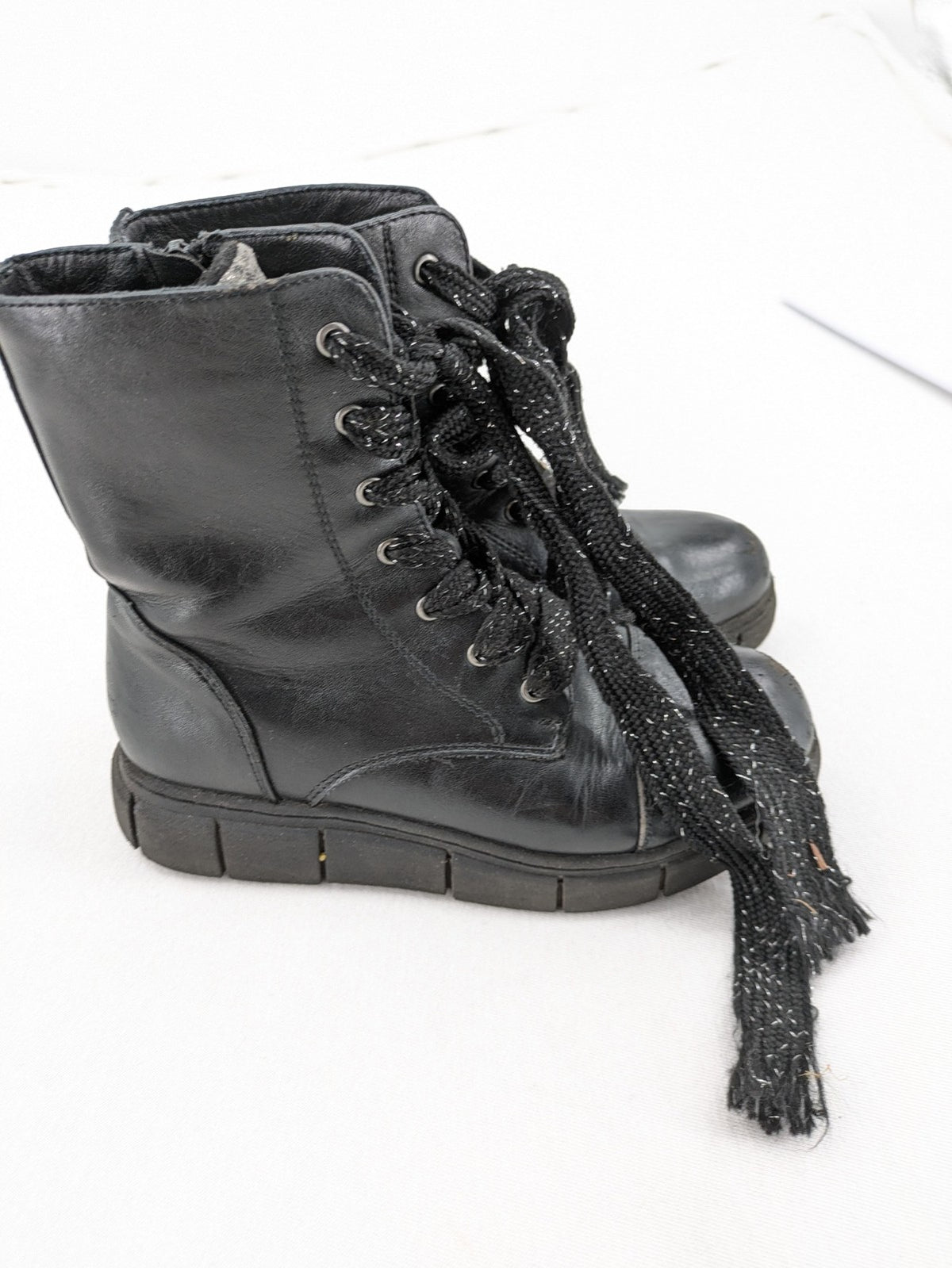 Graceland black combat boots with front lacing and chunky platform sole.