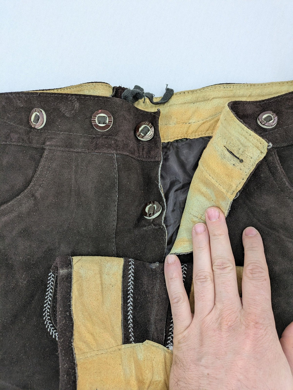 Braun traditional leather pants brown suede with intricate embroidery on bib and legs.