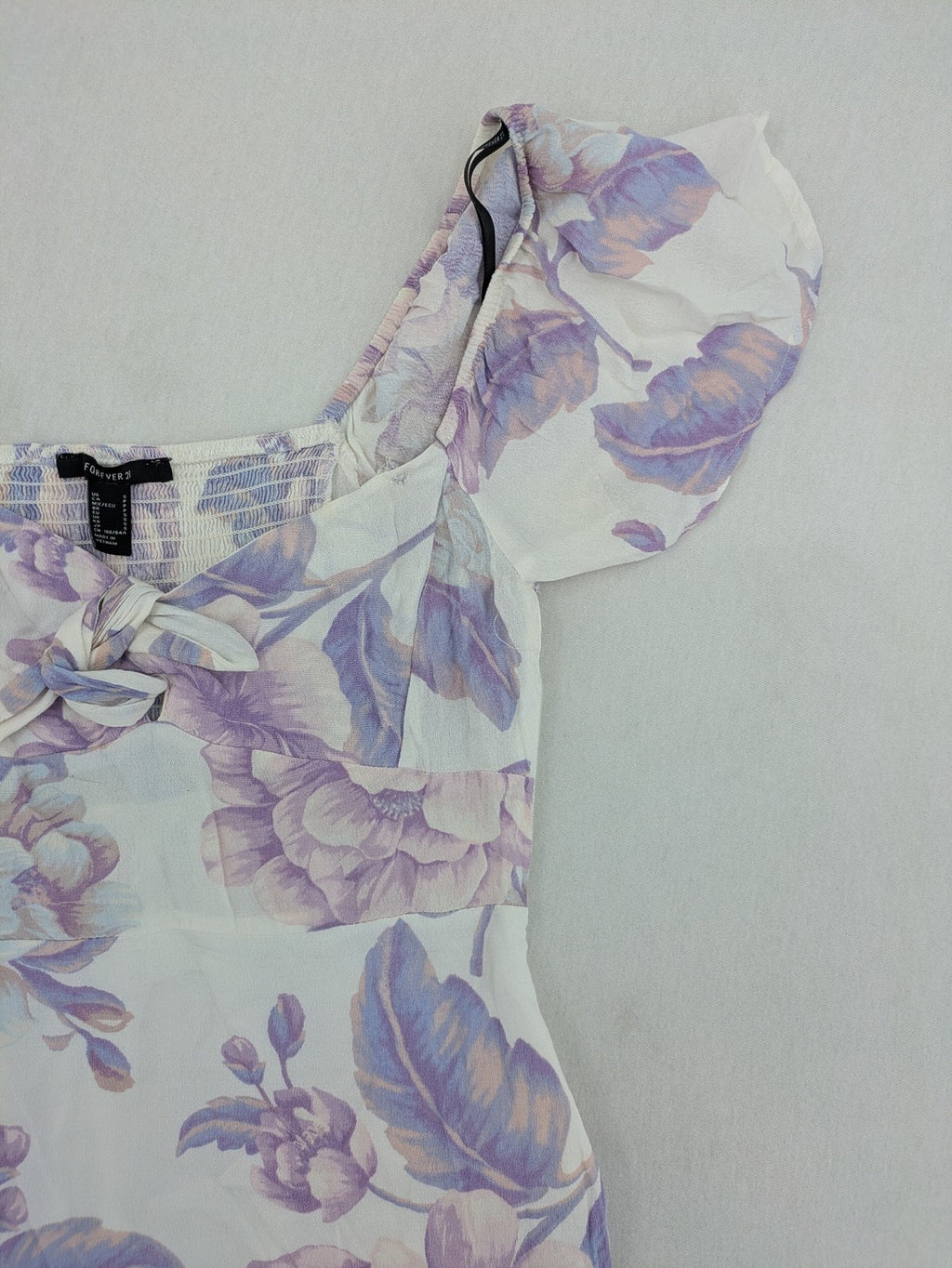 Forever 21 women's midi dress white with blue and purple floral pattern, smocked bodice, puff sleeves.