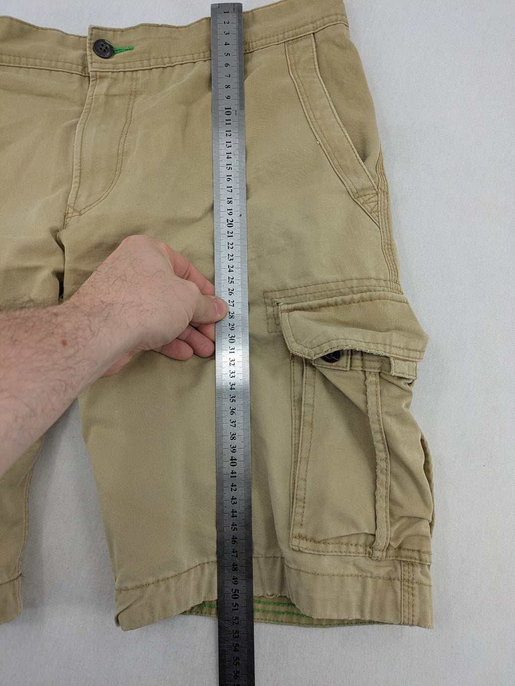 Angelo Litrico beige cargo shorts with multiple pockets and durable cotton material.