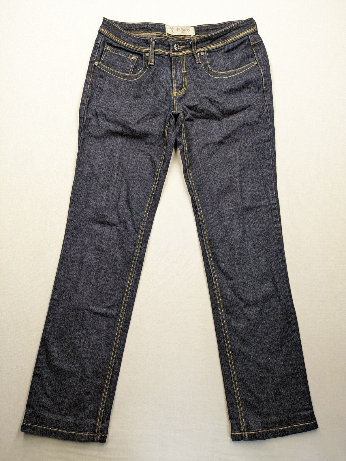 Furore blue straight jeans with yellow contrast stitching and zipper details.