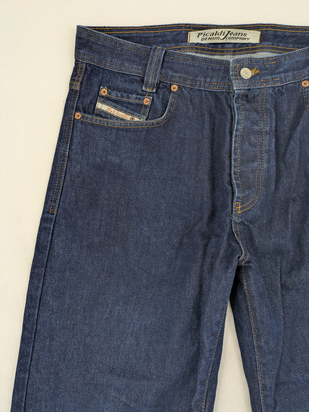 Picaldi blue straight jeans with button fly and frayed hem, 5-pocket design.