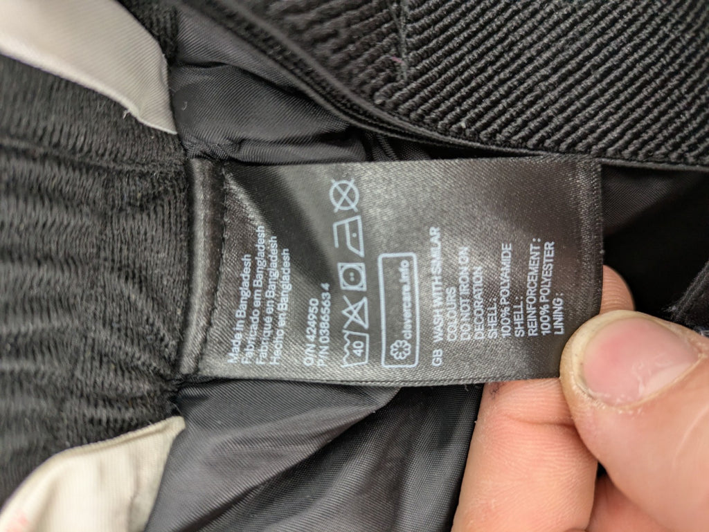 H&M grey snow overalls with adjustable straps and front zipper, durable winter wear.