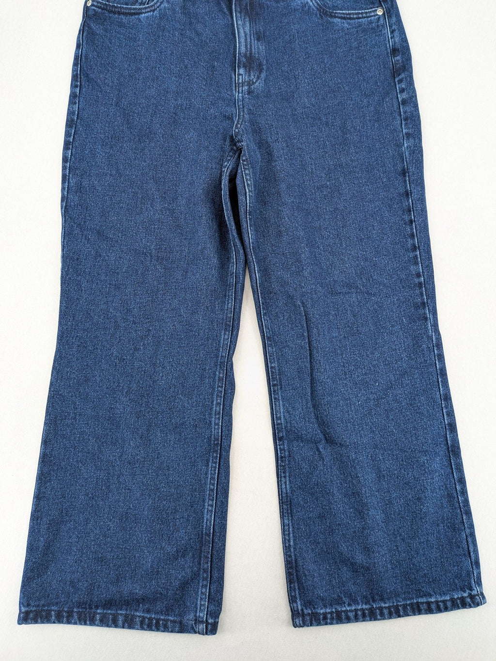 Tchibo blue straight jeans with five-pocket design and wide leg cut in durable cotton.