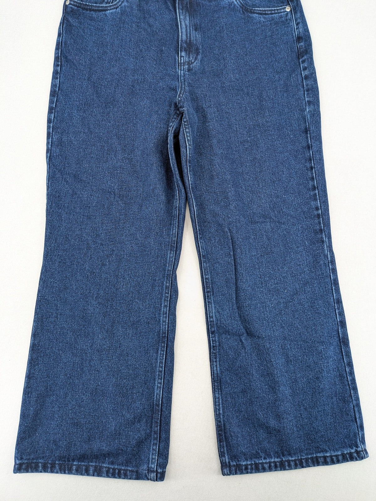 Tchibo blue straight jeans with five-pocket design and wide leg cut in durable cotton.