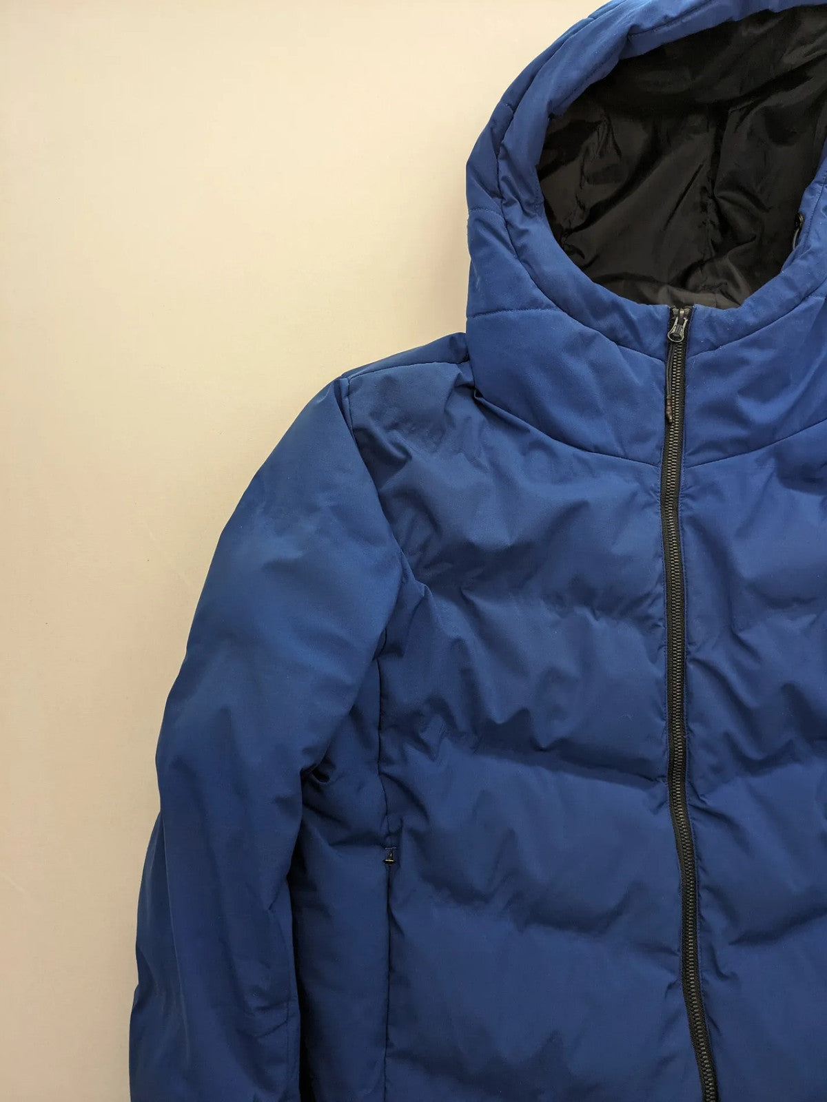 C&A blue winter jacket with hood, zip closure, and multiple pockets, used condition.