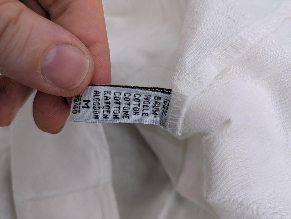 Southwest Castle vintage short-sleeve shirt white with colorful cartoon embroidery and German text.