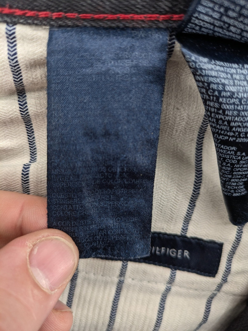 Tommy Hilfiger grey straight jeans faded denim with iconic logo detail.