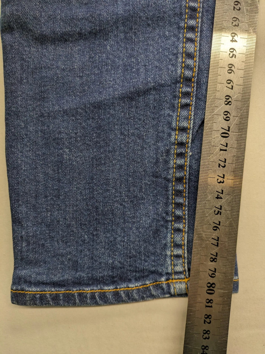 Vingino blue straight jeans medium wash 5-pocket design with zipper fly and stretch denim.