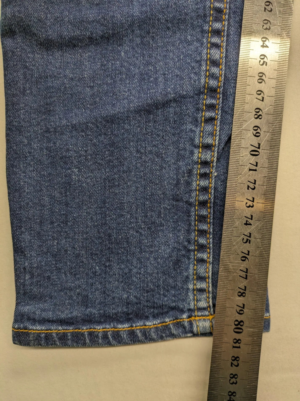 Vingino blue straight jeans medium wash 5-pocket design with zipper fly and stretch denim.