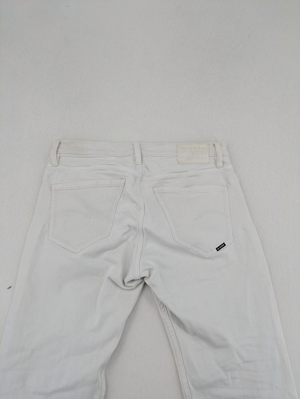 G-Star Raw white straight jeans with logo patch and stretch denim material.